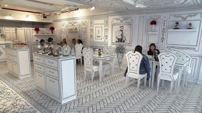The one-of-a-kind cafe gives visitors a chance to step into a drawing. Pawan Singh / The National