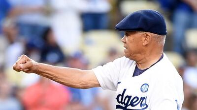Maury Wills throws out a ceremonial first pitch before the game between the Philadelphia Phillies and the Los Angeles Dodgers at Dodger Stadium on July 6, 2015 at Los Angeles. Harry How / Getty Images