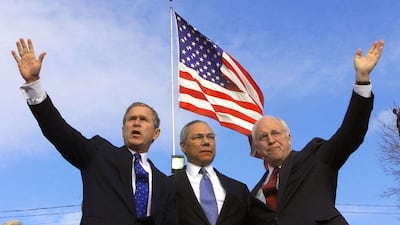 Republican presidential candidate and Texas governor George W. Bush with Colin Powell and Cheney, at a rally in November 2000 in Dearborn, Michigan. AFP