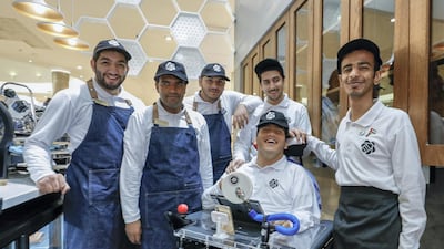 Some of the team has conditions such as autism and cerebral palsy. Photo: Victor Besa / The National