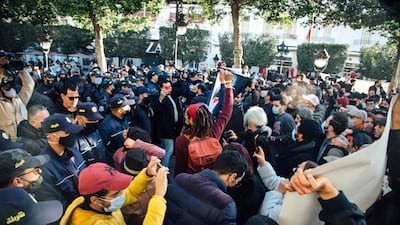 Protesters and police square off on Avenue Habib Bourguiba on Tuesday. Erin Clare Brown / The National