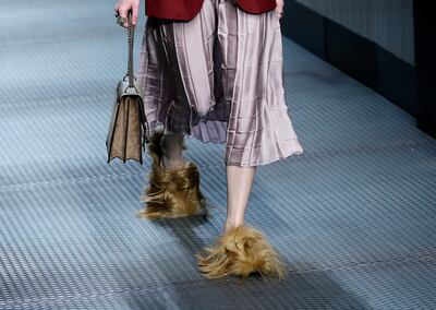 Gucci footwear with wisps of fur before the brand went fur-free. AP