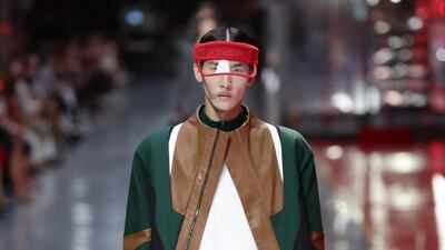 A model walks the runway at the fashion debut of the first co-ed Ferrari collection at Ferrari Factory on June 13, 2021 in Maranello, Italy. Getty Images