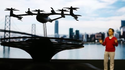 Hyundai unveils a model of the S-A1 urban air taxi concept during a press event for CES 2020 in Las Vegas. The company announced a partnership with Uber to eventually provide electric air taxis. Getty Images/AFP