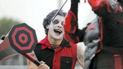 Dubai, United Arab Emirates - April 11, 2019: Visitors dress up as they visit the Middle East Film and Comic Con. Thursday the 11th of April 2019. World Trade Centre, Dubai. Chris Whiteoak / The National