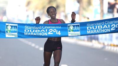 Mula Seboka crosses the finish line to win the 2014 Standard Chartered Dubai Marathon. Courtesy: Standard Chartered Dubai Marathon