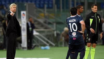 Arsenal manager Arsene Wenger issues instructions to Diego Maradona during the “Match For Peace” at Rome’s Olympic Stadium on September 1, 2014. Valerio Pennicino / Getty Images