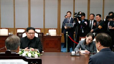 The rival delegations sit at the same table. Korea Summit Press Pool / Korea Summit Press Pool