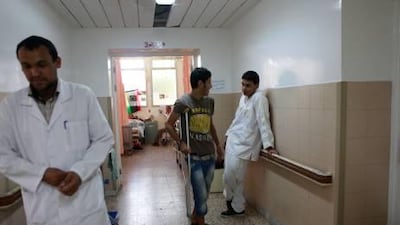 The corridor of the Misrata ward of Al Jalal hospital in Benghazi. Patients are evacuated regularly to the ward from the Misrata hospital which is overwhelmed with casualties and extremely low on supplies. 50 patients have been transferred in the past week.