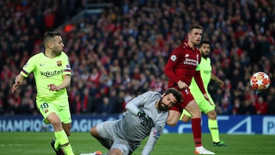 Jordi Alba of Barcelona is foiled by Liverpool's goalkeeper. Getty