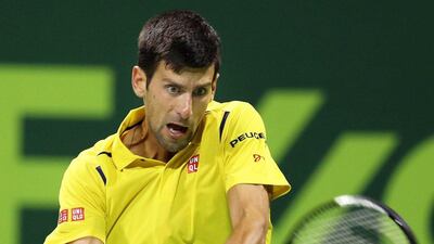Novak Djokovic of Serbia returns the ball to Fernando Verdasco of Spain during their second round match of the Qatar Open tennis tournament at the Khalifa Tennis Complex in Doha, Qatar, 06 January 2016. EPA