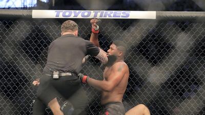 Abu Dhabi, United Arab Emirates - September 07, 2019: Heavyweight bout between Curtis Blaydes (black shorts, winner) and Shamil Abdurakhimov in the Main card at UFC 242. Saturday the 7th of September 2019. Yas Island, Abu Dhabi. Chris Whiteoak / The National