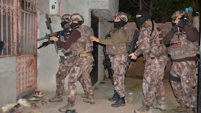 A file photo of a raid by Turkish police officers to arrest ISIS suspects. AP