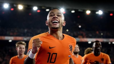 Memphis Depay, celebrating after the Nethelands took a 2-0 against France on Friday night, personifies his team's revival in Europe. EPA