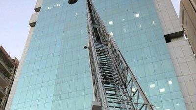 Abu Dhabi Police save two window cleaners from 15-storey fall.