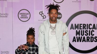 Lil Baby and his son Jason Jones. Reuters