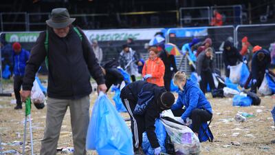 The cleaning up begins after campers and festivalgoers packed up their belongings and left in a steady stream from the Somerset site. EPA