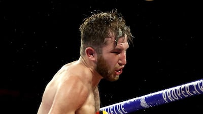 Isaac Lowe (L) punches Alberto Guevara during their featherweight bout at MGM Grand Garden Arena in Las Vegas. AFP