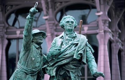 A bronze statue of Jacques Balmet and Dr. Michel-Gabriel Pacccard, who made the first ascent of Mont Blanc in 1786. Getty Images
