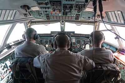 The cockpit and crew members of an Antonov 72 (AN-72) Russian military aircraft during a flight between Khmeimim and Aleppo. AFP