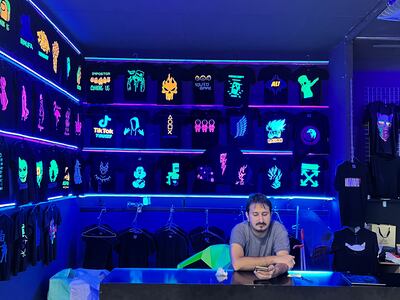 Shopkeeper Haseeb at nearly 2am in Global Village, Dubai. Saeed Saeed / The National