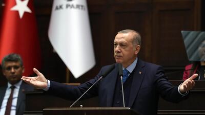 Turkish President Recep Tayyip Erdogan delivers a speech during the Justice and Development Party's parliamentary group meeting at the Grand National Assembly of Turkey in Ankara, on April 24, 2018. Adem Altan / AFP