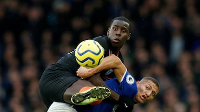 Chelsea's Kurt Zouma in action with Everton's Richarlison. Reuters
