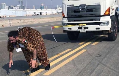 UAE resident Mahmood Shamshun Al Arab holds the record for the heaviest vehicle pulled by hair. Courtesy Guinness