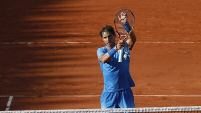Spain's Rafael Nadal celebrates winning the fourth round match of the French Open tennis tournament against Jack Sock of the US in four sets. Michel Euler / AP Photo
