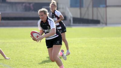 A Dubai Falcons player makes a break against Al Maha at Sharjah Wanderers Sports Club. Khushnum Bhandari / The National