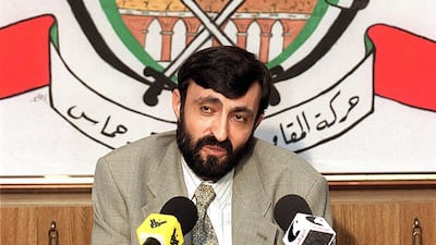 Senior Hamas official Imad Al Alami is seen here on September 23, 1999, talking to journalists at a press conference in the southern suburbs of Beirut. The Palestinian movement said on Tuesday that he had died. Joseph Barrak / AFP