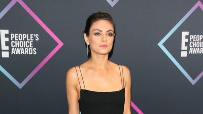 Mila Kunis in a simple Alex Perry dress. Photo / AFP