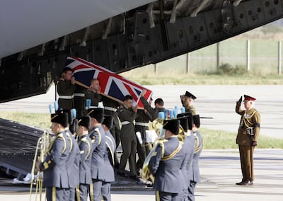 The coffin of a British marine killed in Afghanistan is returned to the UK. AFP