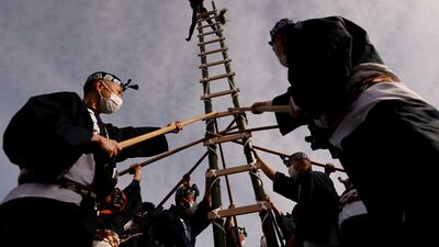 Edo Firemanship Preservation Association members perform during Tokyo Fire Department's New Year's fire review. Reuters
