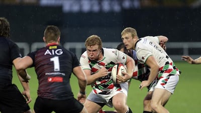 Abu Dhabi Harlequins, in white, up against the Dubai Exiles in the UAE Premiership on April 1, 2016. Jeffrey E Biteng / The National