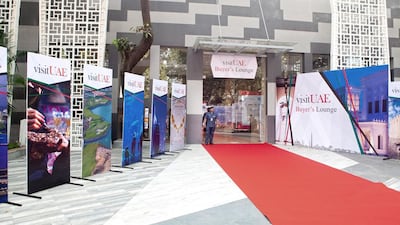 Above, the UAE pavilion at OTM in Mumbai, a three-day travel trade show. Subhash Sharma for The National