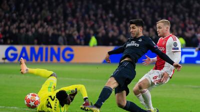 Real Madrid's Marco Asensio scores his side's second goal. AP Photo