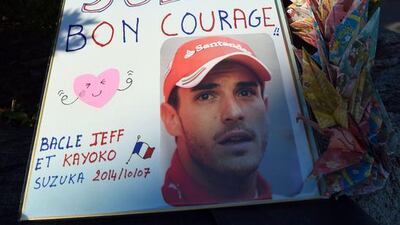 Messages for Marussia driver Jules Bianchi of France are placed at the Mie General Medical Centre in Yokkaichi on October 7, 2014. The French driver underwent emergency surgery on October 5 after slamming into a recovery vehicle on the Suzuka track near the end of a rain-sodden Japanese Grand Prix. TOSHIFUMI KITAMURA / AFP