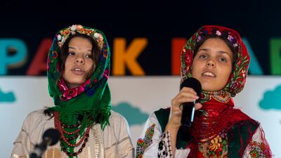 Ukrainian children wearing traditional clothes and sing Christmas carols
