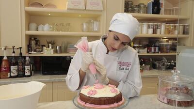 Sidiqa Sohail bakes her own goodies at her new cafe-cum-boutique Spontiphoria. Jeffrey E Biteng / The National