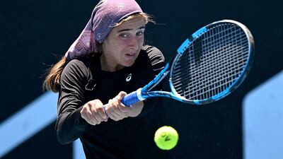 Meshkatolzahra Safi of Iran during a girls doubles match at the Australian Open. AFP