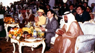 Japanese Crown Prince Naruhito, Princess Masako and Sheikh Tahnoun bin Mohammed, deputy ruler of the Eastern Province of Abu Dhabi, watch a camel race in Al Ain during their four-day visit in 1995. AP