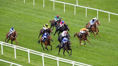 Paul Hanagan riding Muwaary win The Dubai Duty Free Full Of Surprises Handicap Stakes at Newbury Racecourse on April 11, 2014 in Newbury, England. Alan Crowhurst / Getty Images