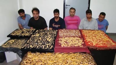 Gang, including these six men, breaks into International City jewellery shop by renting out the property next door and burrowing through an adjoining wall.