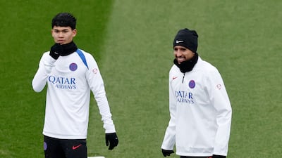 PSG's Dro Fernandez, left, and Marquinhos during training. Reuters