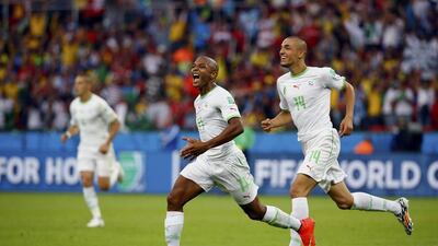 Algeria's Yacine Brahimi, centre, celebrates a goal at the 2014 World Cup in Brazil in June. Damir Sagolj / Reuters / June 22, 2014