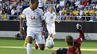 England's Theo Walcott, left, will have a more central role to play in tonight's final .