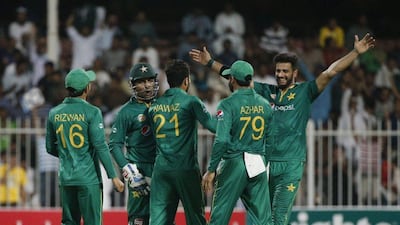 Pakistan’s players celebrate during their ODI win over West Indies in Sharjah. Karim Sahib / AFP