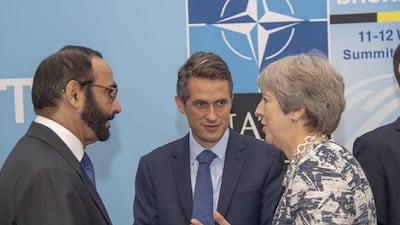 The UAE Minister of State for Defence Mohammed Al Bowardi speaks to British Prime Minister Theresa May during the Nato summit held in Brussels on July 11-12, 2018. Wam
