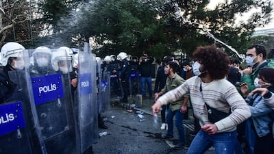 Police in riot gear clash with students of Bogazici University, in Istanbul. AP Photo